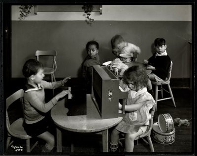 Children playing in the playroom at the New York Association for the Blind, 111 East 59th Street, New York, 1935 by Byron Company